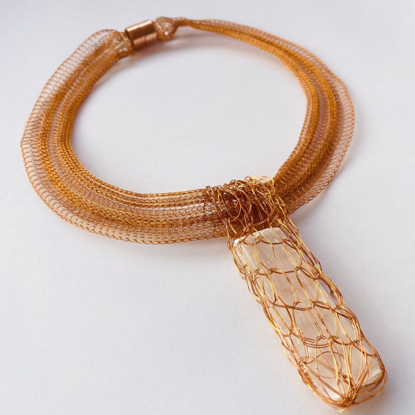 COLLIER COURONNE DE PÉTAUX