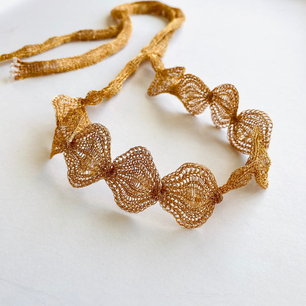 Collar Lazo ojos cobre