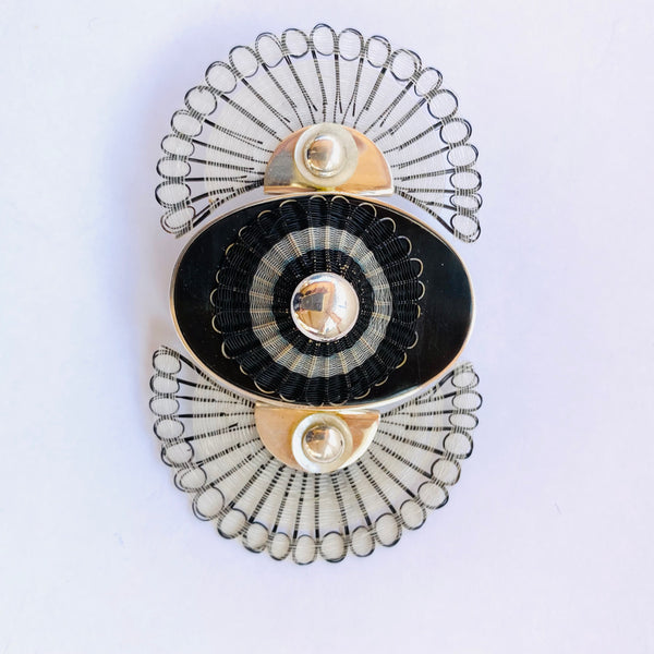 Broche eclipse
