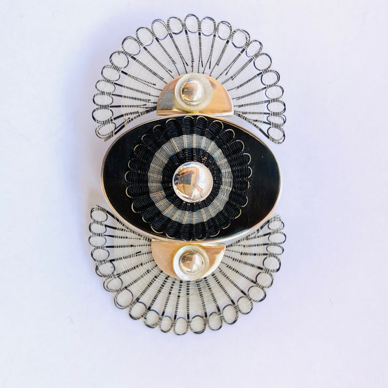 Broche eclipse