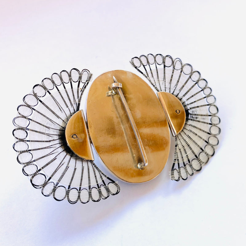 Broche eclipse